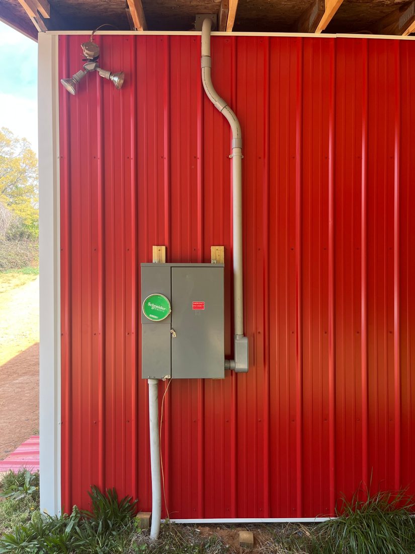 New electrical service installed on the side of a barn