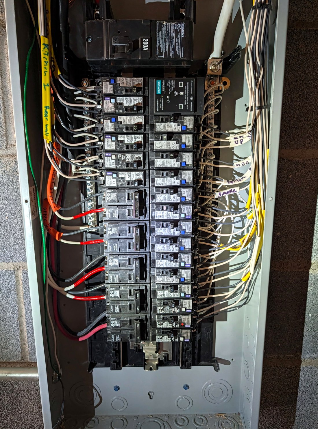 200-amp Siemens panel interior wired and labeled by Goose Electric
